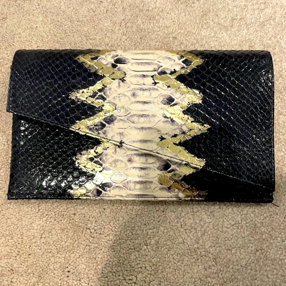 August Clutch like brand new barely used.